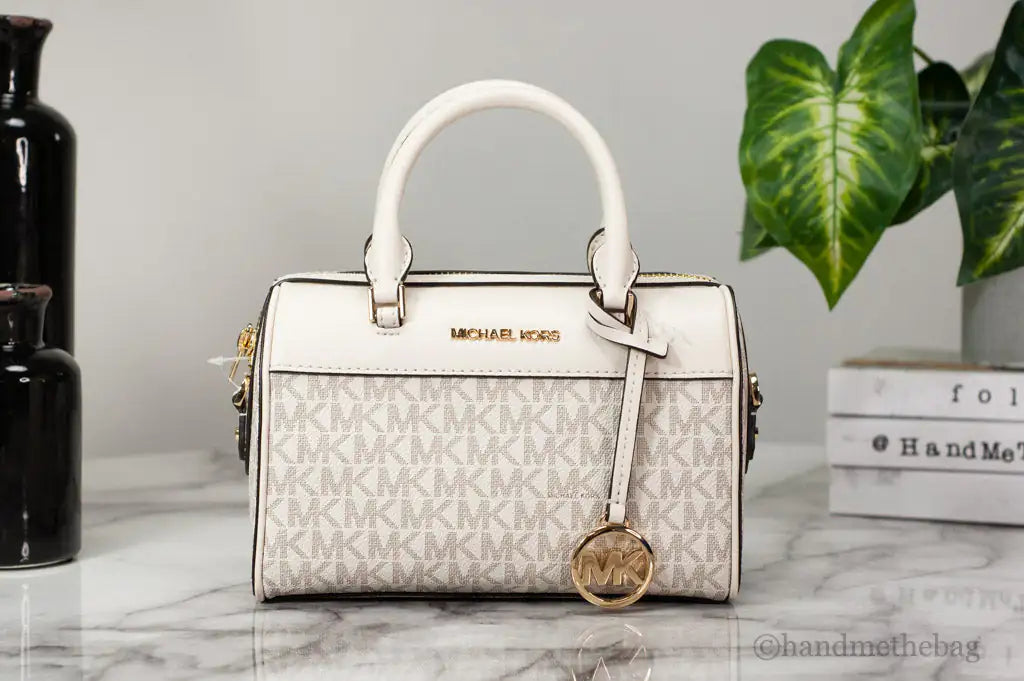 Michael Kors Travel XS Light Cream Signature PVC Duffle Crossbody Handbag